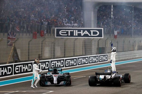 Yas Marina Circuit, Abu Dhabi, United Arab Emirates.
Sunday 26 November 2017.
Valtteri Bottas, Mercedes F1 W08 EQ Power+ and Lewis Hamilton, Mercedes F1 W08 EQ Power+, celebrate on the grid after the race.
World Copyright: Glenn Dunbar/LAT Images 
ref: Digital Image _31I9233