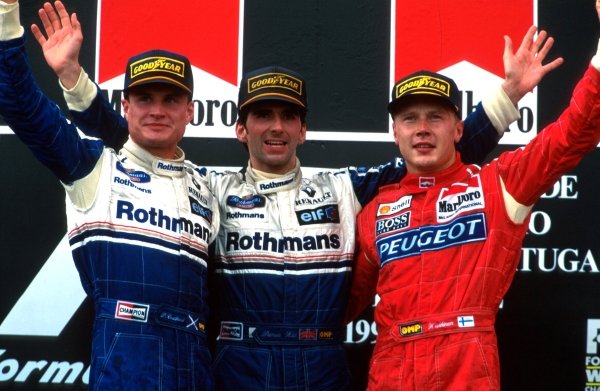 L to R: David Coulthard 2nd, Winner Damon Hill and Mika Hakkinen 3rd
Portugese GP, Estoril, 25 September 1994 L to R: David Coulthard 2nd, Winner Damon Hill and Mika Hakkinen 3rd
Portugese GP, Estoril, 25 September 1994