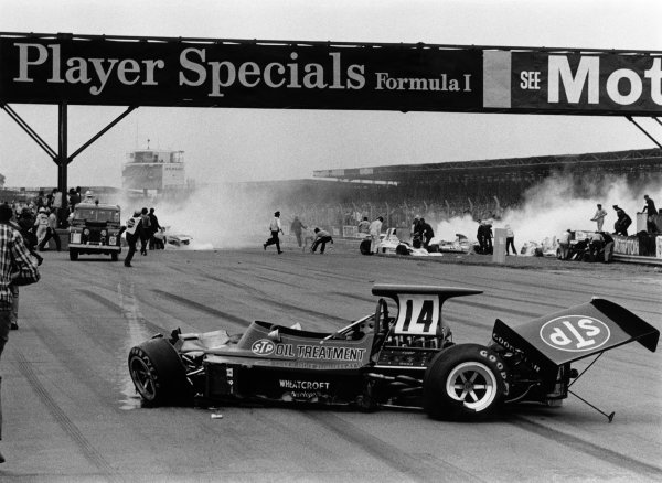 1973 British Grand Prix.
Silverstone, England.
12-14 July 1973.
Jody Scheckter (McLaren M23 Ford) causes a multiple pile-up at the end of lap 1. Amazingly only Andrea de Adamich was injured
In the foreground, the wreckage of Roger Williamson's March 731-Ford. Action.
World Copyright - LAT Photographic