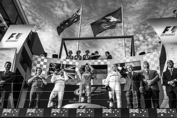 Lewis Hamilton (GBR) Mercedes AMG F1, Luigi Fraboni (ITA) Ferrari Head of Engine Trackside Operations, race winner Sebastian Vettel (GER) Ferrari and Valtteri Bottas (FIN) Mercedes AMG F1 celebrate on the podium with Jackie Stewart (GBR) at Formula One World Championship, Rd1, Australian Grand Prix, Race, Albert Park, Melbourne, Australia, Sunday 26 March 2017.