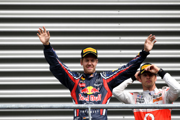 Spa-Francorchamps, Spa, Belgium
28th August 2011.
Sebastian Vettel, Red Bull Racing RB7 Renault, 1st position, arrives on the podium. Portrait. Podium.
World Copyright: Andy Hone/LAT Photographic
ref: Digital Image CI0C2420 Spa-Francorchamps, Spa, Belgium
28th August 2011.
Sebastian Vettel, Red Bull Racing RB7 Renault, 1st position, arrives on the podium. Portrait. Podium.
World Copyright: Andy Hone/LAT Photographic
ref: Digital Image CI0C2420