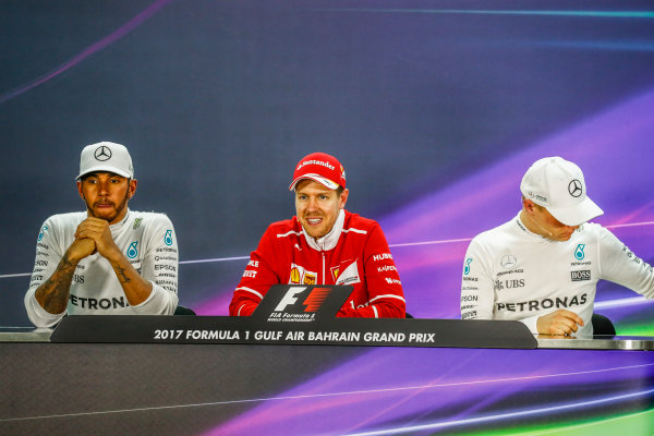 Bahrain International Circuit, Sakhir, Bahrain.
Sunday 16 April 2017.
Lewis Hamilton, Mercedes AMG, 2nd Position, Sebastian Vettel, Ferrari, 1st Position, and Valtteri Bottas, Mercedes AMG, 3rd Position, in the Press Conference.
World Copyright: Sam Bloxham/LAT Images
ref: Digital Image _W6I3351 Bahrain International Circuit, Sakhir, Bahrain.
Sunday 16 April 2017.
Lewis Hamilton, Mercedes AMG, 2nd Position, Sebastian Vettel, Ferrari, 1st Position, and Valtteri Bottas, Mercedes AMG, 3rd Position, in the Press Conference.
World Copyright: Sam Bloxham/LAT Images
ref: Digital Image _W6I3351