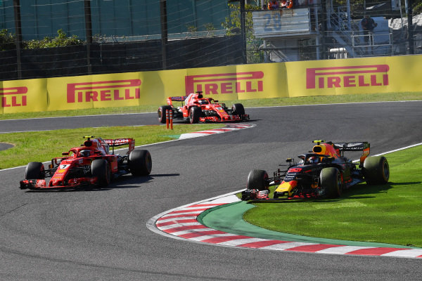 Kimi Raikkonen, Ferrari SF71H amd Max Verstappen, Red Bull Racing RB14 battle