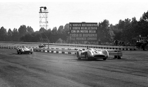 1955 Italian Grand Prix.
Monza, Italy. 9-11 September 1955.
Winner Juan Manuel Fangio leads Stirling Moss (both stream-lined Mercedes-Benz W196) in front of the banking. Fangio finished in 1st position.
World Copyright - LAT Photographic
Ref: 338#6 1955 Italian Grand Prix.
Monza, Italy. 9-11 September 1955.
Winner Juan Manuel Fangio leads Stirling Moss (both stream-lined Mercedes-Benz W196) in front of the banking. Fangio finished in 1st position.
World Copyright - LAT Photographic
Ref: 338#6