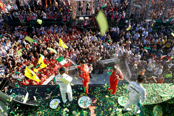 Albert Park, Melbourne, Australia.
Sunday 26 March 2017.
Sebastian Vettel, Ferrari, 1st Position, Luigi Fraboni, Head of Power Unit Race Operation, Ferrari, Lewis Hamilton, Mercedes AMG, 2nd Position, and Valtteri Bottas, Mercedes AMG, 3rd Position, celebrate on the podium.
World Copyright: Steven Tee/LAT Images
Ref: Digital Image _O3I3317 Albert Park, Melbourne, Australia.
Sunday 26 March 2017.
Sebastian Vettel, Ferrari, 1st Position, Luigi Fraboni, Head of Power Unit Race Operation, Ferrari, Lewis Hamilton, Mercedes AMG, 2nd Position, and Valtteri Bottas, Mercedes AMG, 3rd Position, celebrate on the podium.
World Copyright: Steven Tee/LAT Images
Ref: Digital Image _O3I3317