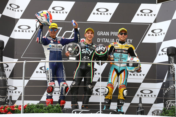 2017 Moto3 Championship - Round 6
Mugello, Italy
Sunday 4 June 2017
Podium: second place Fabio Di Giannantonio, Del Conca Gresini Racing Moto3, Race winner Andrea Migno, Sky Racing Team VR46, third place Juan Francisco Guevara, RBA Racing Team
World Copyright: Gold & Goose Photography/LAT Images
ref: Digital Image 674651 2017 Moto3 Championship - Round 6
Mugello, Italy
Sunday 4 June 2017
Podium: second place Fabio Di Giannantonio, Del Conca Gresini Racing Moto3, Race winner Andrea Migno, Sky Racing Team VR46, third place Juan Francisco Guevara, RBA Racing Team
World Copyright: Gold & Goose Photography/LAT Images
ref: Digital Image 674651