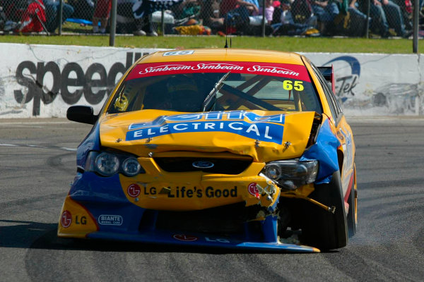 2003 Australian V8 Supercars
Oran Park, Sydney, Australia. 17th August 2003.
Ford driver Paul Radisich retires after being hit by Rick Kelly on the first lap of todays 300km race at Sydneys Oran Park. 
World Copyright: Mark Horsburgh/LAT Photographic
ref: Digital Image Only