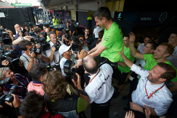 Autodromo Hermanos Rodriguez, Mexico City, Mexico.
Sunday 29 October 2017.

Lewis Hamilton, Mercedes AMG, celebrates with his team after securing the world drivers championship title for the fourth time.World Copyright: Steve Etherington/LAT Images 
ref: Digital Image SNE14525
