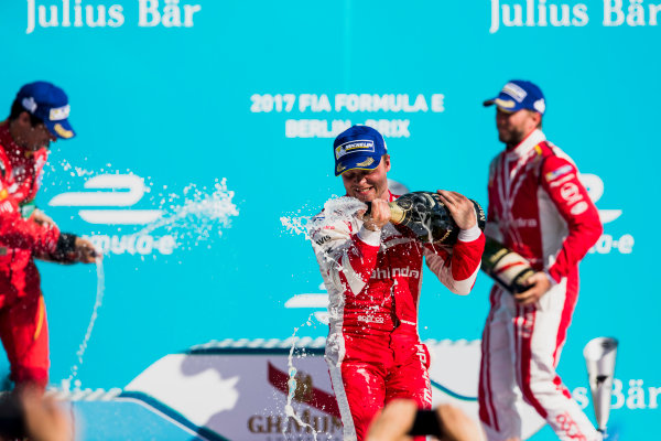 2016/2017 FIA Formula E Championship.
Round 7 - Berlin ePrix, Tempelhof Airport, Berlin, Germany.
Saturday 10 June 2017.
Felix Rosenqvist (SWE), Mahindra Racing, Spark-Mahindra, Mahindra M3ELECTRO, sprays the chamapagne on the podium.
Photo: Zak Mauger/LAT/Formula E
ref: Digital Image _54I7692 2016/2017 FIA Formula E Championship.
Round 7 - Berlin ePrix, Tempelhof Airport, Berlin, Germany.
Saturday 10 June 2017.
Felix Rosenqvist (SWE), Mahindra Racing, Spark-Mahindra, Mahindra M3ELECTRO, sprays the chamapagne on the podium.
Photo: Zak Mauger/LAT/Formula E
ref: Digital Image _54I7692