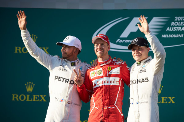 Albert Park, Melbourne, Australia.
Sunday 26 March 2017.
Lewis Hamilton, Mercedes AMG, 2nd Position, Sebastian Vettel, Ferrari, 1st Position, and Valtteri Bottas, Mercedes AMG, 3rd Position, on the podium.
World Copyright: Steve Etherington/LAT Images
ref: Digital Image SNE25438 Albert Park, Melbourne, Australia.
Sunday 26 March 2017.
Lewis Hamilton, Mercedes AMG, 2nd Position, Sebastian Vettel, Ferrari, 1st Position, and Valtteri Bottas, Mercedes AMG, 3rd Position, on the podium.
World Copyright: Steve Etherington/LAT Images
ref: Digital Image SNE25438