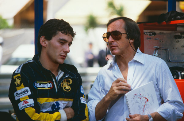 1986 Monaco Grand Prix.
Monte Carlo, Monaco. 8th - 11th May 1986.
Ayrton Senna (Lotus 98T-Renault), 3rd position, in converstaion with 3 times World Champion, Jackie Stewart, portrait. 
World Copyright: LAT Photographic.
Ref:  86MON73.