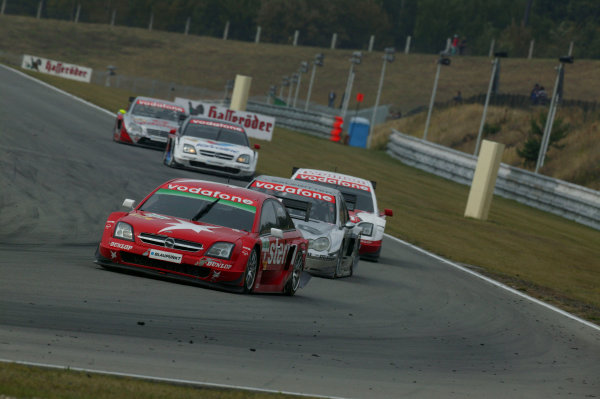 2004 DTM Championship.
Brno, Czech Repulic. 18th - 19th September
Heinz Harald Frentzen (OPC Holzer Opel Vectra GTS) leads Jean Alesi (HWA Mercedes C-Class), Timo Scheider (OPC Holzer Opel Vectra GTS), Peter Dumbreck (OPC Phoenix Opel Vectra GTS) and Bernd Schneider (HWA Mercedes C-Class). Action. 
World Copyright: Andre Irlmeier/LAT Photographic
Ref:Digital image only