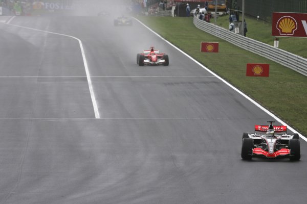 2006 Hungarian Grand Prix - Sunday Race
Hungaroring, Budapest, Hungary. 3rd - 6th August.
Pedro de la Rosa, McLaren MP4/21-Mercedes-Benz, 2nd position, leads Michael Schumacher, Ferrari 248F1, 8th position, action.
World Copyright: Charles Coates/LAT Photographic
ref: Digital Image MB5C0422