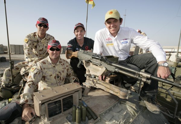 2007 Australian V8 Supercars.
Bahrain International Circuit. Sakhir, Bahrain.
2nd - 4th November. 
Craig Lowndes and Jason Bright get ready to tryout the armored troop carriers  during a visit to the Australian troops based at Tallil Airbase located approximately 310 kilometers Southeast of Baghdad, Iraq.
World Copyright: Mark Horsburgh/LAT Photographic. 
Ref: Digital Image V8-Drivers-IRAQ-7435