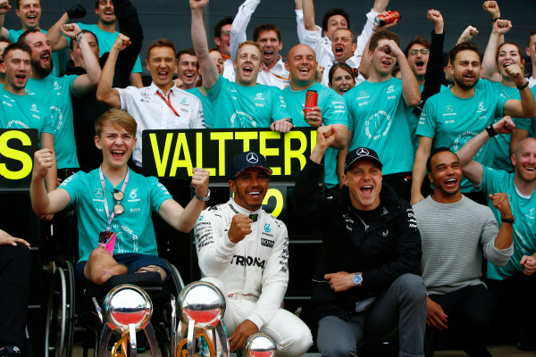 Silverstone, Northamptonshire, UK.
Sunday 16 July 2017.
Lewis Hamilton, Mercedes AMG, 1st Position, and Valtteri Bottas, Mercedes AMG, 2nd Position, celebrate with Billy Monger and their team.
World Copyright: Andrew Hone/LAT Images
ref: Digital Image _ONY8173 Silverstone, Northamptonshire, UK.
Sunday 16 July 2017.
Lewis Hamilton, Mercedes AMG, 1st Position, and Valtteri Bottas, Mercedes AMG, 2nd Position, celebrate with Billy Monger and their team.
World Copyright: Andrew Hone/LAT Images
ref: Digital Image _ONY8173