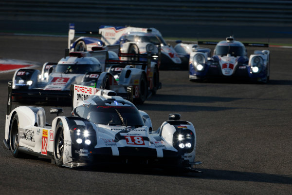 2015 FIA World Endurance Championship
Bahrain 6-Hours
Bahrain International Circuit, Bahrain
Saturday 21 November 2015.
Romain Dumas, Neel Jani, Marc Lieb (#18 LMP1 Porsche AG Porsche 919 Hybrid) leads Lucas Di Grassi, Lo?c Duval, Oliver Jarvis (#8 LMP1 Audi Sport Team Joest Audi R18 e-tron quattro), Anthony Davidson, S?bastien Buemi, Kazuki Nakajima (#1 LMP1 Toyota Racing Toyota TS 040 Hybrid) and Alexander Wurz, St?phane Sarrazin, Mike Conway (#2 LMP1 Toyota Racing Toyota TS 040 Hybrid).
World Copyright: Alastair Staley/LAT Photographic
ref: Digital Image _79P0129