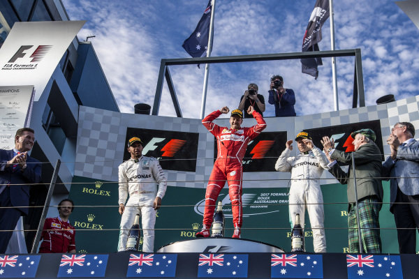 Lewis Hamilton (GBR) Mercedes AMG F1, Luigi Fraboni (ITA) Ferrari Head of Engine Trackside Operations, race winner Sebastian Vettel (GER) Ferrari and Valtteri Bottas (FIN) Mercedes AMG F1 celebrate on the podium with Jackie Stewart (GBR) at Formula One World Championship, Rd1, Australian Grand Prix, Race, Albert Park, Melbourne, Australia, Sunday 26 March 2017. Lewis Hamilton (GBR) Mercedes AMG F1, Luigi Fraboni (ITA) Ferrari Head of Engine Trackside Operations, race winner Sebastian Vettel (GER) Ferrari and Valtteri Bottas (FIN) Mercedes AMG F1 celebrate on the podium with Jackie Stewart (GBR) at Formula One World Championship, Rd1, Australian Grand Prix, Race, Albert Park, Melbourne, Australia, Sunday 26 March 2017.