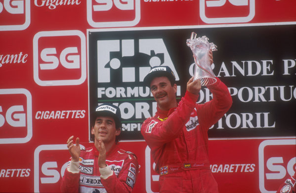 1990 Portuguese Grand Prix.
Estoril, Portugal.
21-23 September 1990.
Nigel Mansell (Ferrari) celebrates 1st position on the podium, with Ayrton Senna (McLaren Honda) 2nd position next to him.
Ref-90 POR 02.
World Copyright - LAT Photographic
1990 Portuguese Grand Prix.
Estoril, Portugal.
21-23 September 1990.
Nigel Mansell (Ferrari) celebrates 1st position on the podium, with Ayrton Senna (McLaren Honda) 2nd position next to him.
Ref-90 POR 02.
World Copyright - LAT Photographic