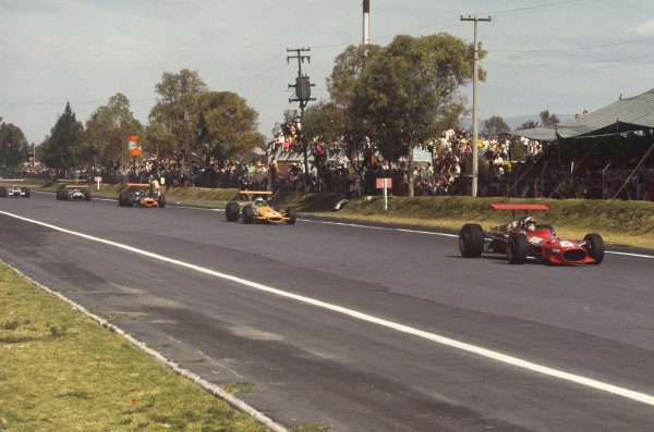 1968 Mexican Grand Prix.
Mexico City, Mexico. 1st-3rd November 1968.
Chris Amon, Ferrari 312, leads Denny Hulme, McLaren M7A Ford, Pedro Rodriguez, BRM P133, Jochen Rindt, Brabham BT26 Repco, and Jo Siffert, Lotus 49B Ford.
Ref: 68MEX61. World Copyright: LAT Photographic 1968 Mexican Grand Prix.
Mexico City, Mexico. 1st-3rd November 1968.
Chris Amon, Ferrari 312, leads Denny Hulme, McLaren M7A Ford, Pedro Rodriguez, BRM P133, Jochen Rindt, Brabham BT26 Repco, and Jo Siffert, Lotus 49B Ford.
Ref: 68MEX61. World Copyright: LAT Photographic