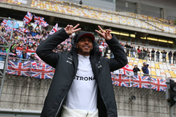 Shanghai International Circuit, Shanghai, China.  Sunday 09 April 2017. 
Lewis Hamilton, Mercedes AMG, celebrates victory in front of a grandstand adorned by British flags.
World Copyright: Charles Coates/LAT Images 
ref: Digital Image AN7T0909