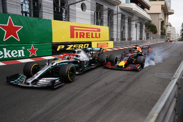 Max Verstappen, Red Bull Racing RB15, makes contact with leader Lewis Hamilton, Mercedes AMG F1 W10, in the closing stages of the race Max Verstappen, Red Bull Racing RB15, makes contact with leader Lewis Hamilton, Mercedes AMG F1 W10, in the closing stages of the race