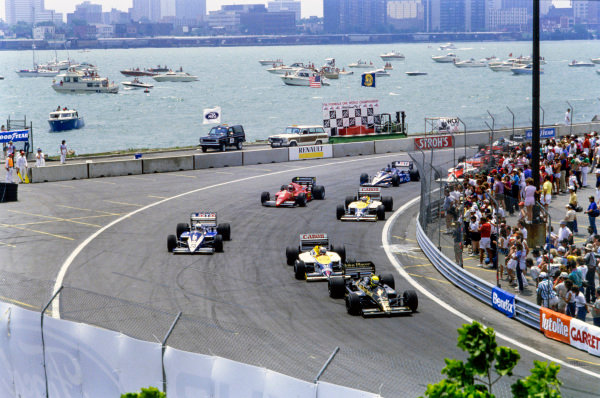 Ayrton Senna, Lotus 98T Renault, leads Nigel Mansell, Williams FW11 Honda.