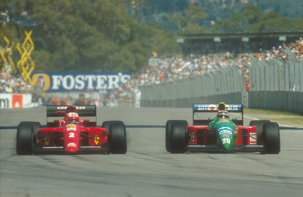 1990 Australian Grand Prix.
Adelaide, Australia.
2-4 November 1990.
Nelson Piquet (Benetton B190 Ford) overtakes Nigel Mansell (Ferrari 641) for 2nd place. They finished in 1st and 2nd positions respectively.
Ref-90 AUS 11.
World Copyright - LAT Photographic
1990 Australian Grand Prix.
Adelaide, Australia.
2-4 November 1990.
Nelson Piquet (Benetton B190 Ford) overtakes Nigel Mansell (Ferrari 641) for 2nd place. They finished in 1st and 2nd positions respectively.
Ref-90 AUS 11.
World Copyright - LAT Photographic