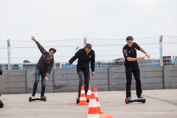 2014/2015 FIA Formula E Championship.
Berlin ePrix, Berlin Tempelhof Airport, Germany.
Thursday 21 May 2015
Scott Speed (USA)/Andretti Autosport - Spark-Renault SRT_01E, Nelson Piquet Jr (BRA)/China Racing - Spark-Renault SRT_01E and Jerome D'Ambrosio (BEL)/Dragon Racing - Spark-Renault SRT_01E on hovertrax.
Photo: Andrew Ferraro/LAT/Formula E
ref: Digital Image _FER0892
2014/2015 FIA Formula E Championship.
Berlin ePrix, Berlin Tempelhof Airport, Germany.
Thursday 21 May 2015
Scott Speed (USA)/Andretti Autosport - Spark-Renault SRT_01E, Nelson Piquet Jr (BRA)/China Racing - Spark-Renault SRT_01E and Jerome D'Ambrosio (BEL)/Dragon Racing - Spark-Renault SRT_01E on hovertrax.
Photo: Andrew Ferraro/LAT/Formula E
ref: Digital Image _FER0892