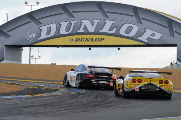 Circuit de La Sarthe, Le Mans, France. 13th - 17th June 2012. 
Race
Paul Daniels/Markus Palttala/Joel Camathias, JWA-AVILA, No
55 Porsche 911 RSR (997), leads Patrick Bornhausser/Julien Canal/Pedro Lamy, Larbre Competition, No
50 Chevrolet Corvette C6-ZR1. 
Photo: Jeff Bloxham/LAT Photographic.  
ref: Digital Image DSC_3381