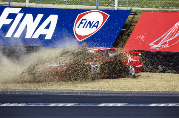 Lee Brookes, Brookes Motorsport, Peugeot 406, spins into the gravel trap