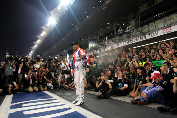 Yas Marina Circuit, Abu Dhabi, United Arab Emirates.
Sunday 23 November 2014.
Lewis Hamilton, Mercedes AMG, 1st Position, celebrates 2014 Championship victory with his team.
World Copyright: Andrew Ferraro/LAT Photographic.
ref: Digital Image _MG_1552 Yas Marina Circuit, Abu Dhabi, United Arab Emirates.
Sunday 23 November 2014.
Lewis Hamilton, Mercedes AMG, 1st Position, celebrates 2014 Championship victory with his team.
World Copyright: Andrew Ferraro/LAT Photographic.
ref: Digital Image _MG_1552