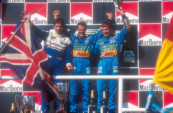 Hungaroring, Hungary.
12-14 August 1994.
Michael Schumacher (Benetton Ford) 1st position, Damon Hill (Williams Renault) 2nd position and Jos Verstappen (Benetton Ford) 3rd position on the podium.
Ref-94 HUN 02.
World Copyright - LAT Photographic