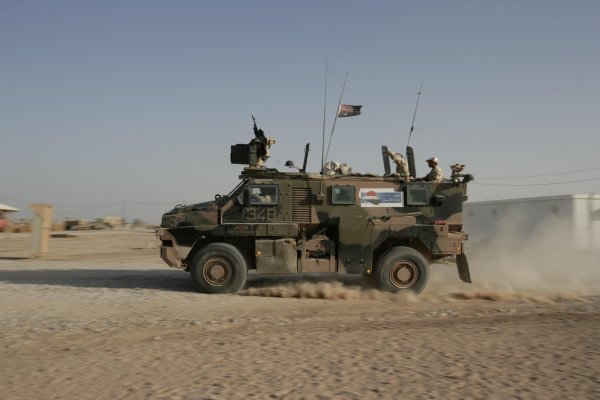 2007 Australian V8 Supercars.
Bahrain International Circuit. Sakhir, Bahrain.
2nd - 4th November.
Greg Murphy and Rick Kelly at the wheel of armored troop carriers during a visit to the Australian troops based at Tallil Airbase located approximately 310 kilometers Southeast of Baghdad, Iraq.
World Copyright: Mark Horsburgh/LAT Photographic.
Ref: Digital Image V8-Drivers-IRAQ-7445 2007 Australian V8 Supercars.
Bahrain International Circuit. Sakhir, Bahrain.
2nd - 4th November.
Greg Murphy and Rick Kelly at the wheel of armored troop carriers during a visit to the Australian troops based at Tallil Airbase located approximately 310 kilometers Southeast of Baghdad, Iraq.
World Copyright: Mark Horsburgh/LAT Photographic.
Ref: Digital Image V8-Drivers-IRAQ-7445