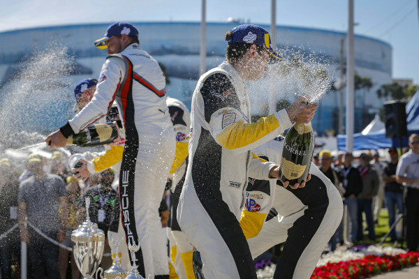 #4 Corvette Racing Corvette C7.R, GTLM: Oliver Gavin, Tommy Milner, #912 Porsche GT Team Porsche 911 RSR, GTLM: Earl Bamber, Laurens Vanthoor, #3 Corvette Racing Corvette C7.R, GTLM: Jan Magnussen, Antonio Garcia celebrate on the podium with champagne #4 Corvette Racing Corvette C7.R, GTLM: Oliver Gavin, Tommy Milner, #912 Porsche GT Team Porsche 911 RSR, GTLM: Earl Bamber, Laurens Vanthoor, #3 Corvette Racing Corvette C7.R, GTLM: Jan Magnussen, Antonio Garcia celebrate on the podium with champagne