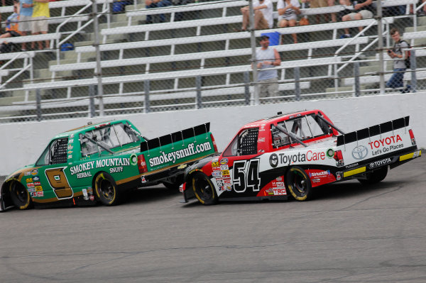 13-14 April, 2013, Rockingham, North Carolina USA
Ron Hornaday Jr leads Darrell Wallace Jr.
©2013, David Griffin
LAT Photo USA 13-14 April, 2013, Rockingham, North Carolina USA
Ron Hornaday Jr leads Darrell Wallace Jr.
©2013, David Griffin
LAT Photo USA